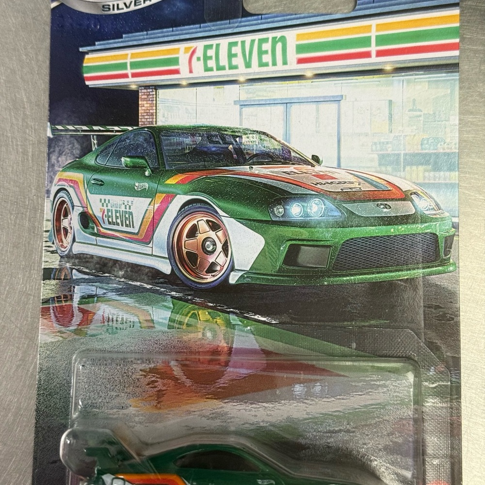 Green and Orange Racing Model Cars